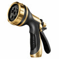 Pistolet d'arrosage 20 x 14 cm en plastique noir et doré à jet réglable